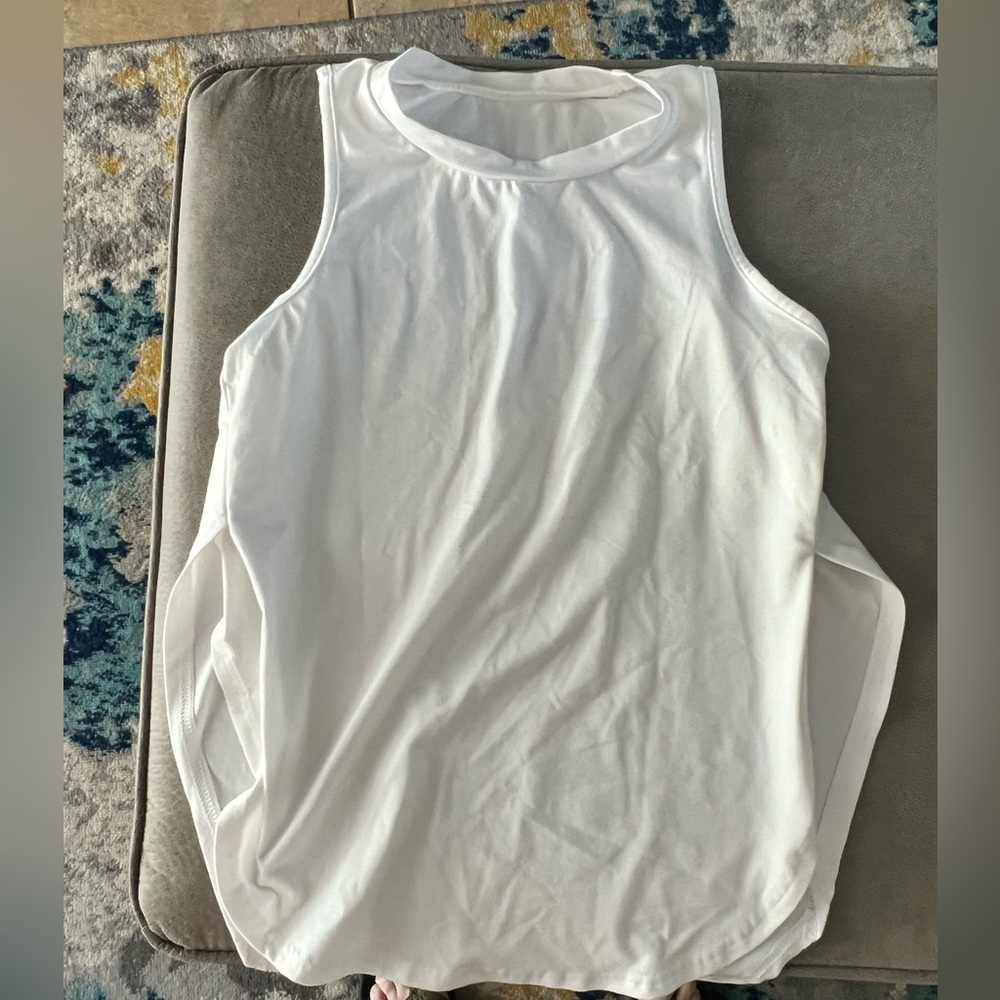 White tank top with high slits on both sides. New